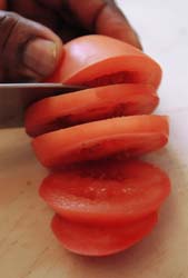 sharpKnife2 knife cutting tomato