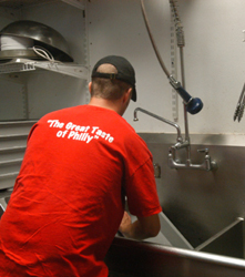 lookInside02 employee washing dishes