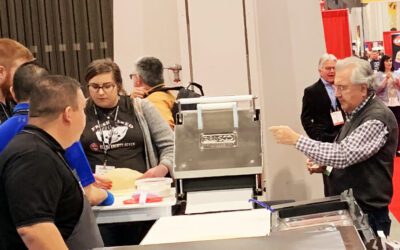 Crowds Gather Around 12-18 Wedge Press at BE&SCO’S Booth at Pizza Expo