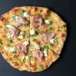 mortadella, pizza, pistachios, burrata,