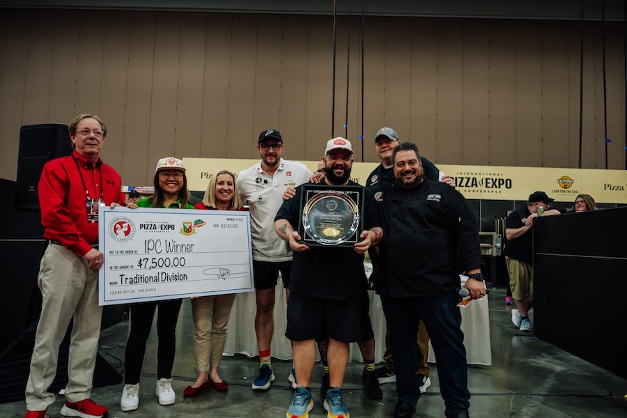 Wilhelm Rodriguez of Papas Pizza, Cabo Rojo, Puerto Rico, wins the Traditional Division at the International Pizza Challenge during Pizza Expo in Las Vegas.