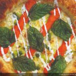 Cheese pizza recipe with burrata cream and fried basil by Chris Decker, founder of Truly Pizza in Dana Point, California
