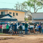 The Cipriani family works the grand opening for Sips & Pies Wood-Fired Pizza.