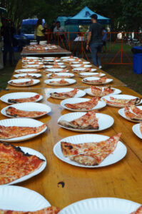 Image of pizza slices baked for the world's biggest pizza party.