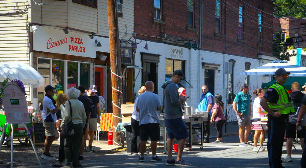 Image of the block party to celebrate Casano's Pizza Parlor's one-year anniversary.
