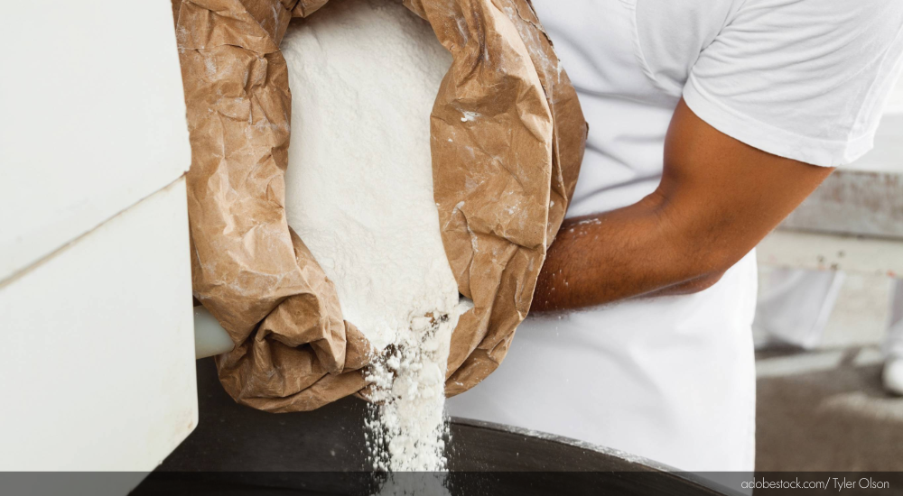 pouring flour into mixer, unbleached unbromated flour